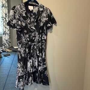 Light weight silk dress with built in tie and ruffle on bottom